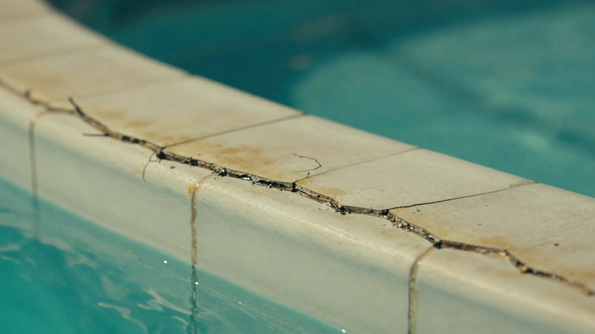 crack in a swimming pool shell plaster that can cause a leak
