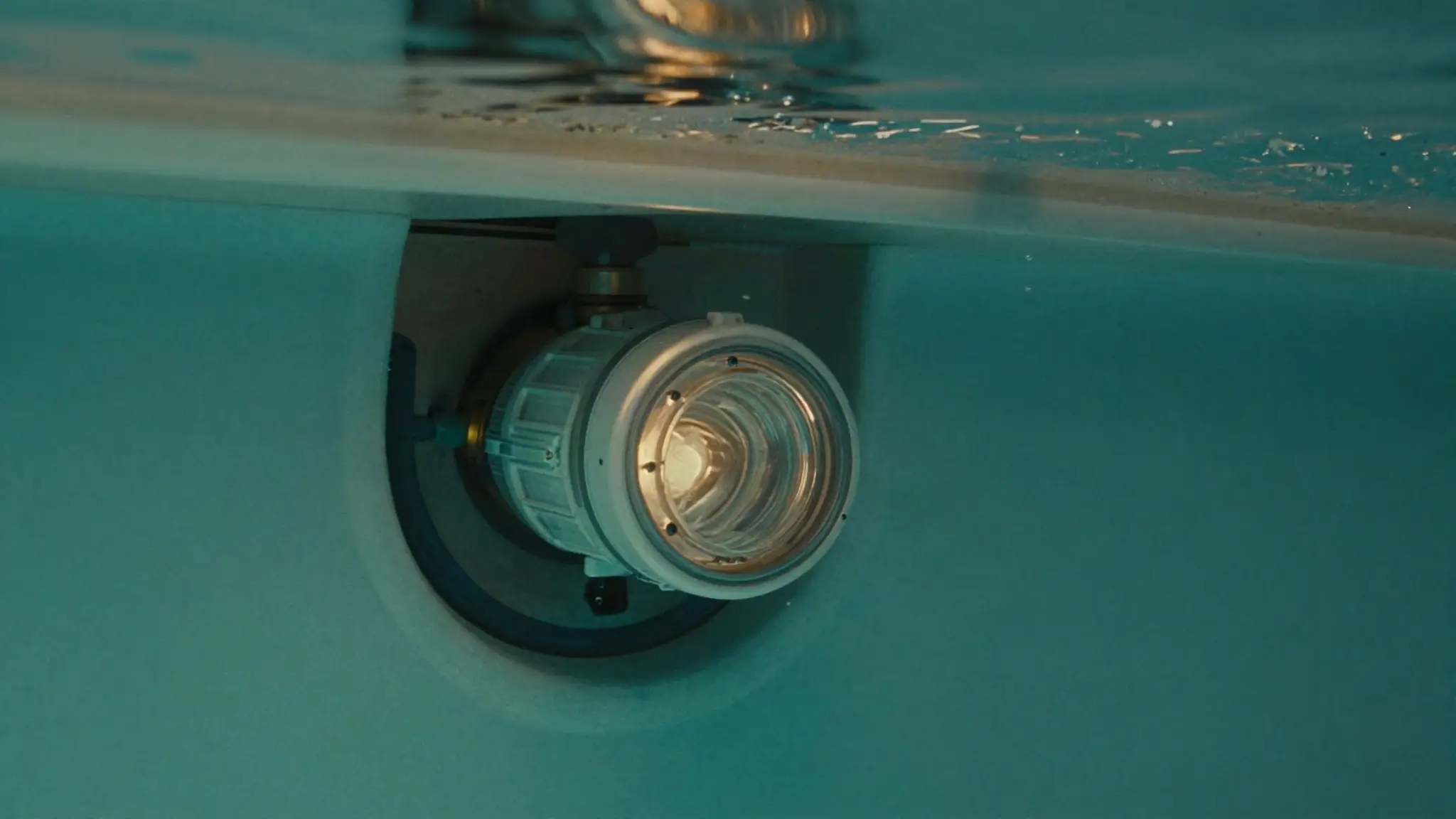 pool light niche where leaks commonly develop behind the fixture