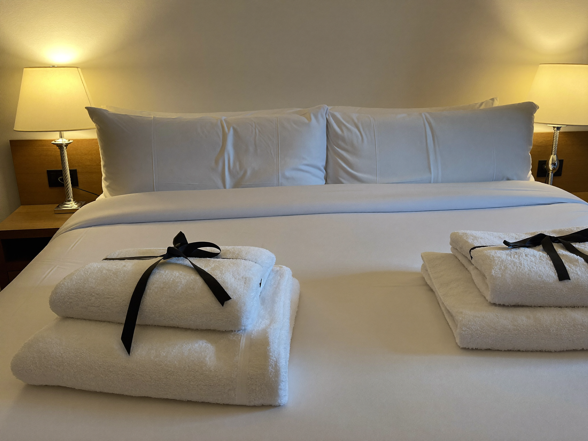 Airbnb bedroom staged with fresh linens for guests