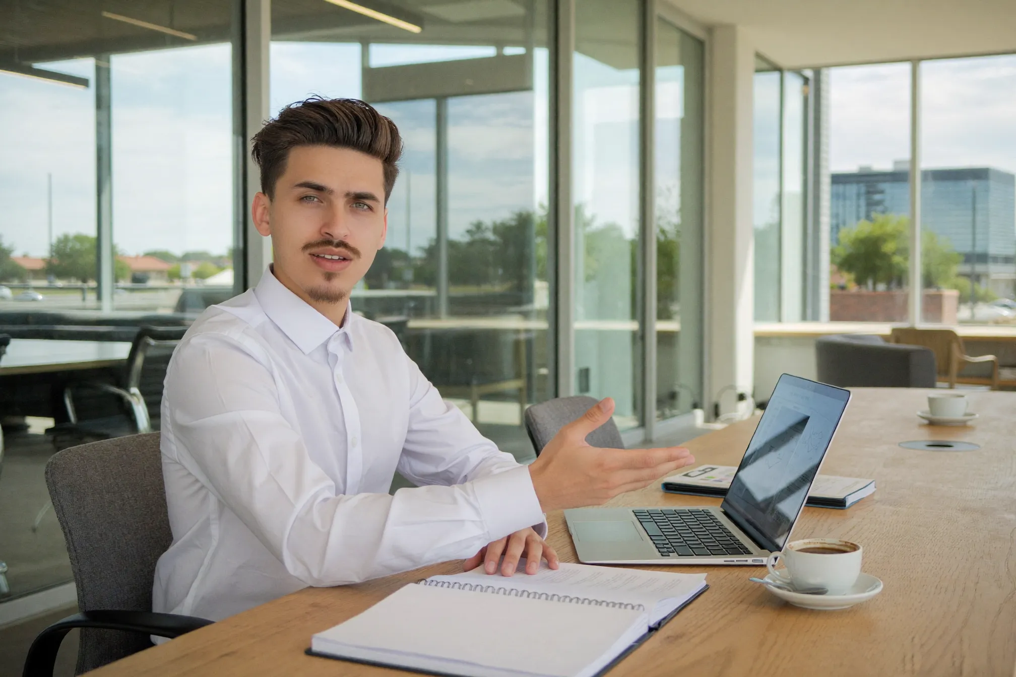 Daniel walking a client through a website design during a consultation