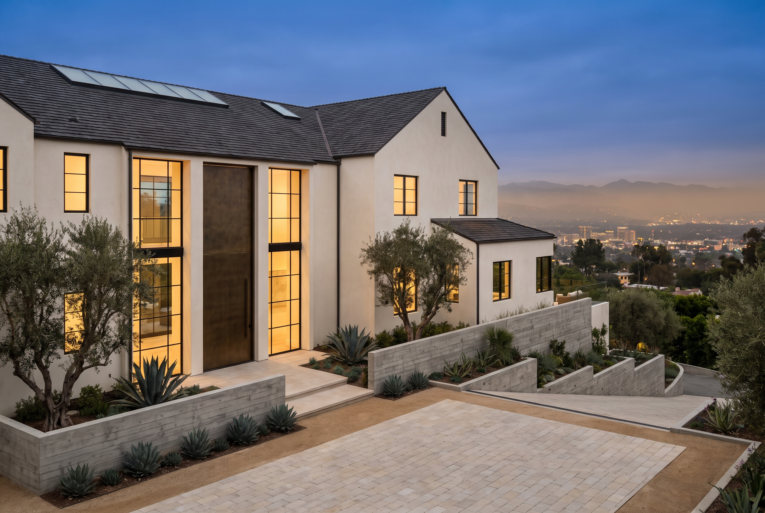 Ground-up custom home on a Los Angeles hillside at blue hour