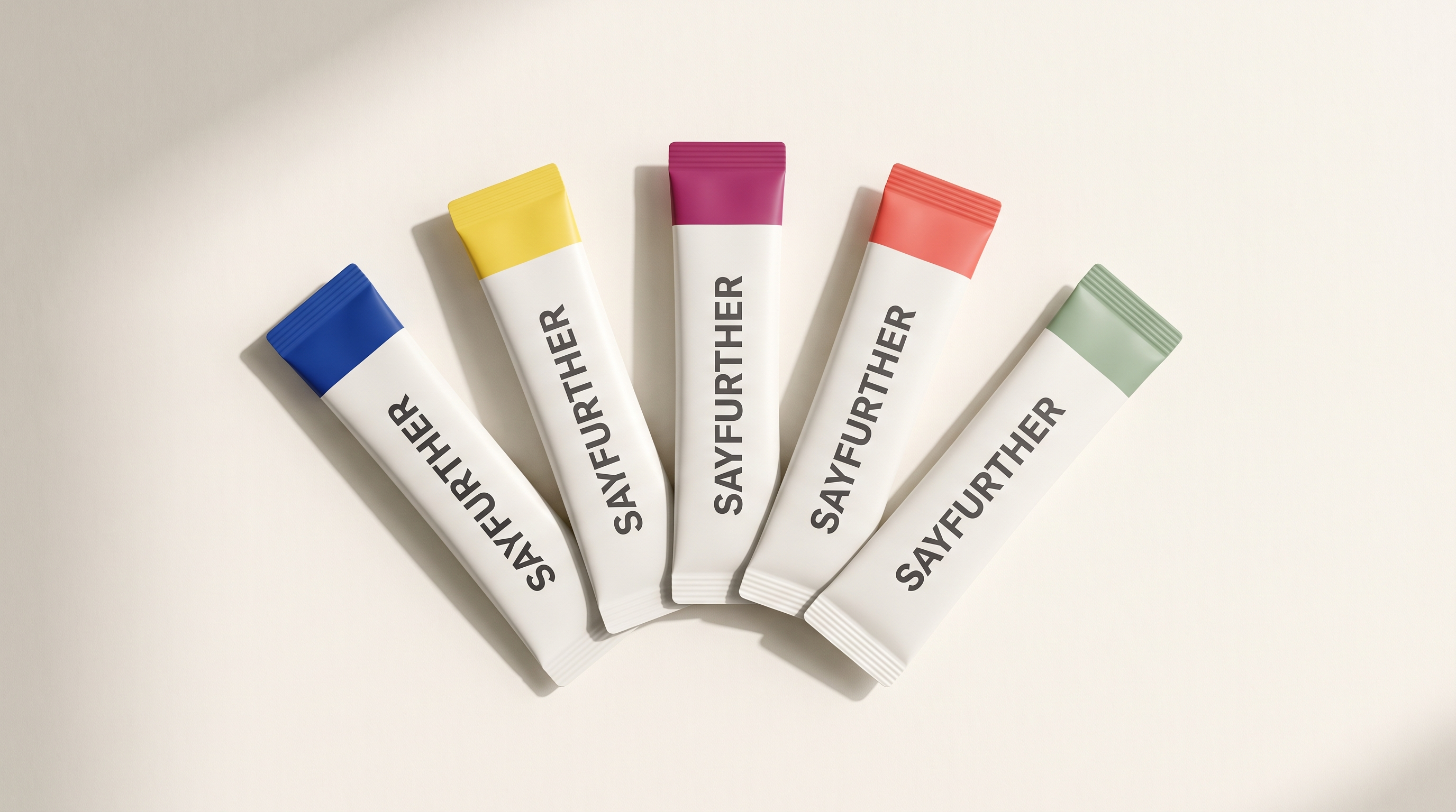 Five SAYFURTHER electrolyte stick sachets fanned out on a pale surface