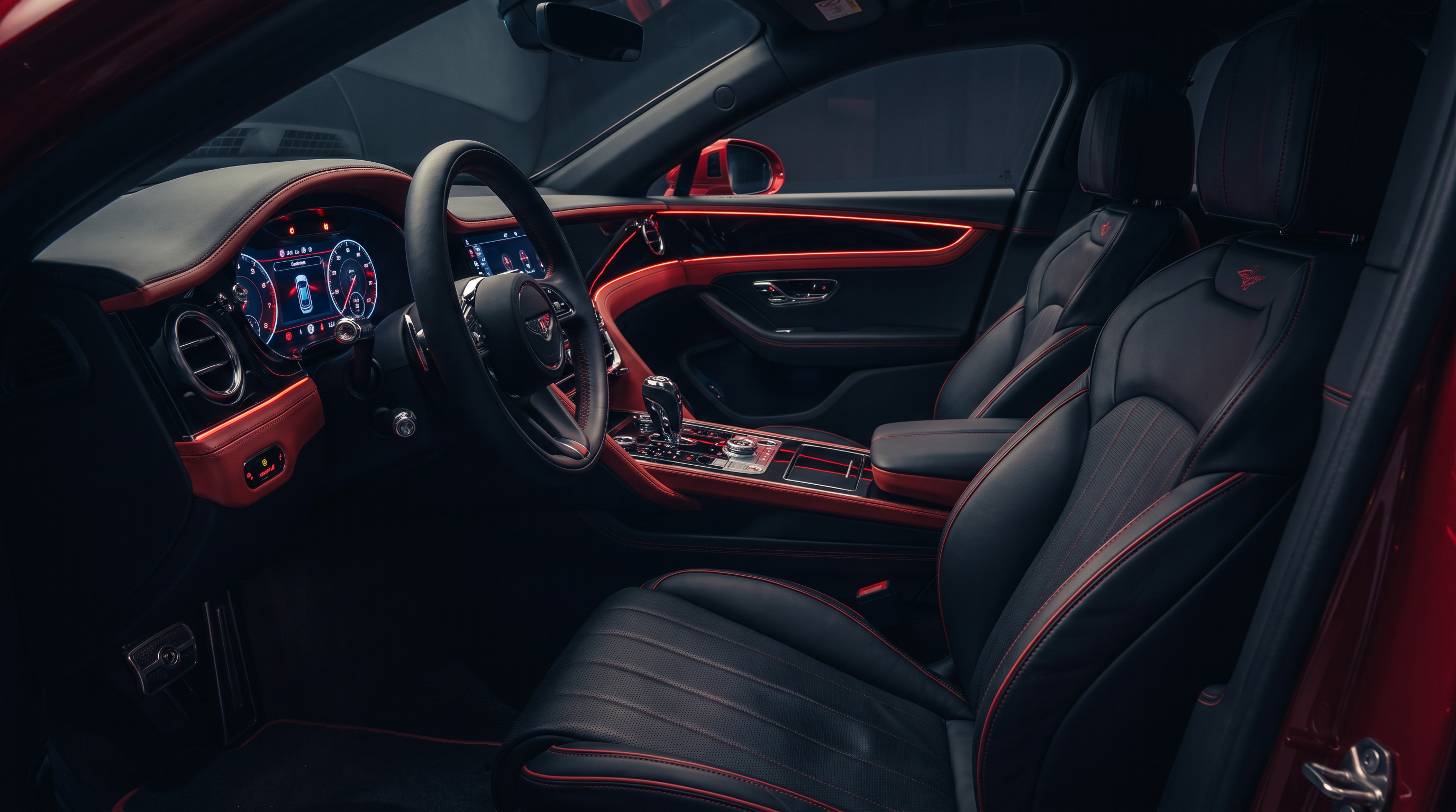 Interior of black sedan with red ambient lighting