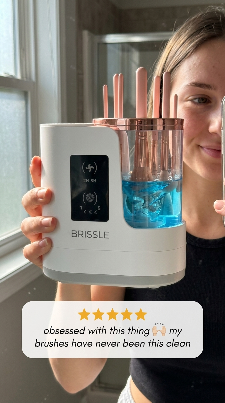 Customer holding Brissle brush cleaner with review