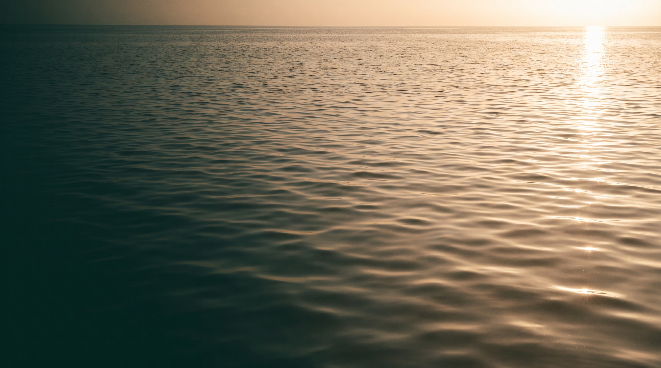 Sunlit water at golden hour