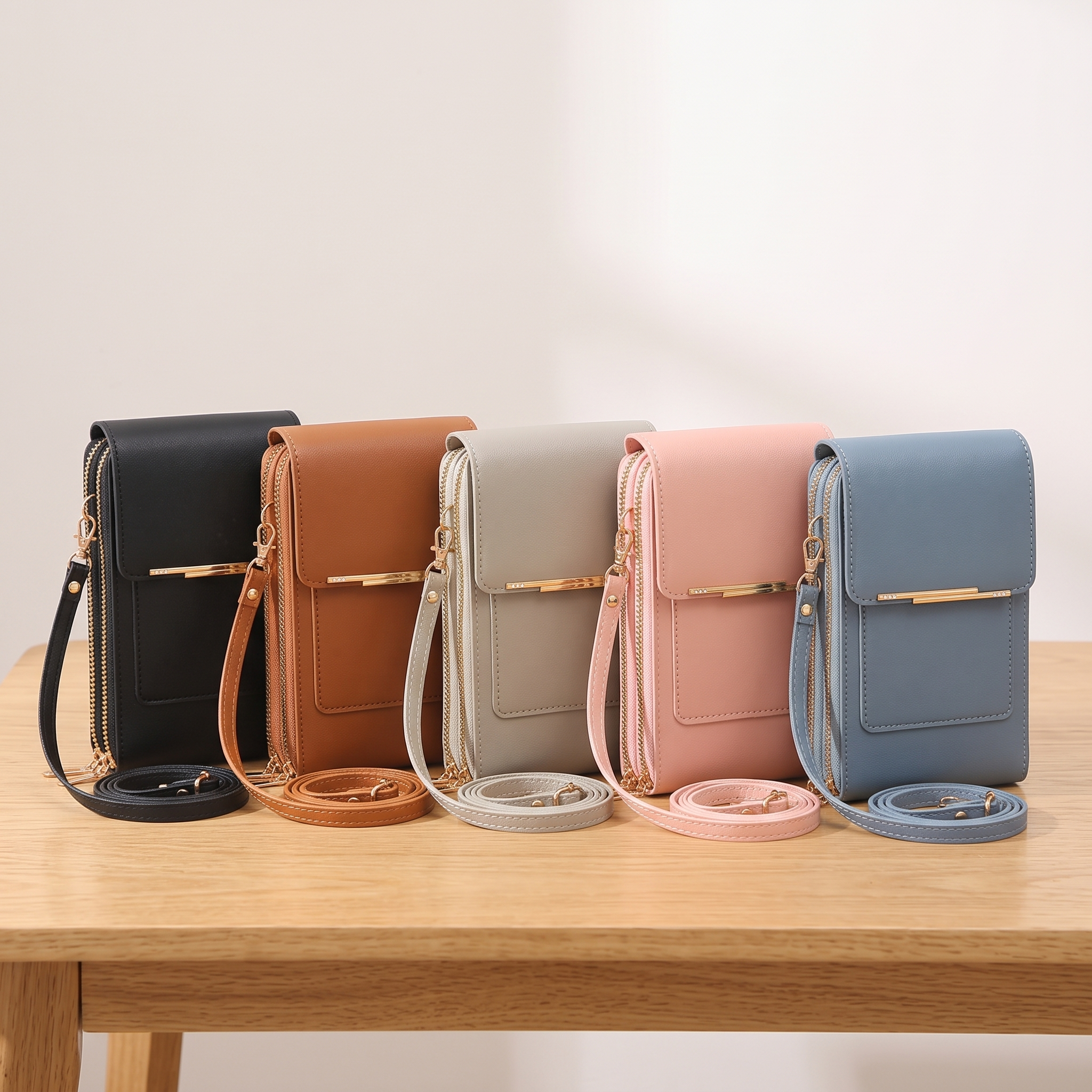 Portella in zwart, bruin, grijs, roze en blauw naast elkaar
